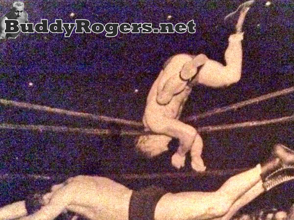 Nature Boy Buddy Rogers gets his neck caught in the ropes during this June 21, 1950 matchup with Lou Thesz at Wrigley Field